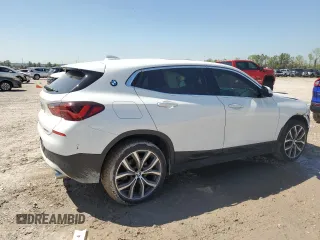 2023 BMW X2 sDrive28i with VIN WBXYH9C00P5V38984, listed as a Copart auction lot 50739725 with 47,287 mi miles and Salvage Title. Bid and sale history available at carsss.com. Image 3.