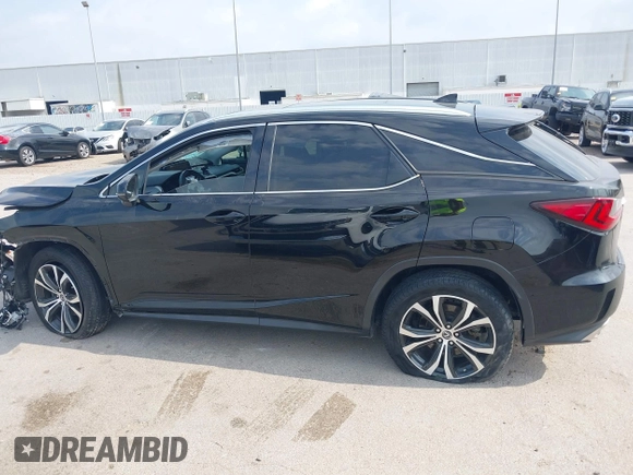 2018 Lexus RX 350 with VIN 2T2ZZMCA1JC103035, listed as a IAAI auction lot 42241695 with 104,382 mi miles and . Bid and sale history available at DreamBid. Image 15.