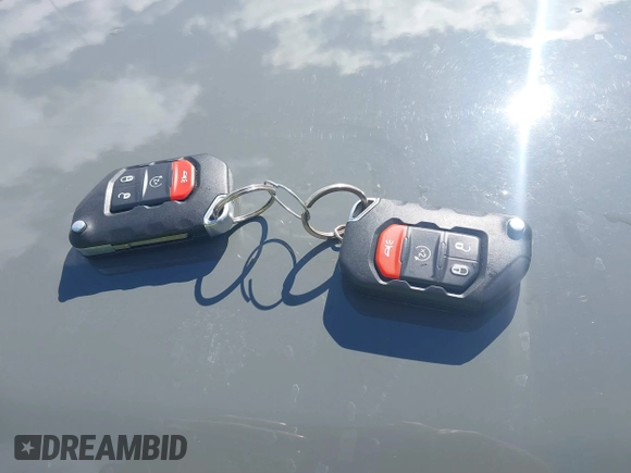 2020 Jeep Wrangler Unlimited Sport Altitude with VIN 1C4HJXDG2LW335228, listed as a IAAI auction lot 41711295 with 43,451 mi miles and . Bid and sale history available at DreamBid. Image 11.