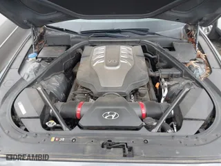 2015 Hyundai Genesis 5.0L with VIN KMHGN4JF7FU076421, listed as a IAAI auction lot 41698201 with 68,672 mi miles. Bid and sale history available at carsss.com. Image 10.