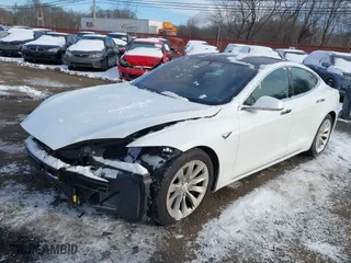 2017 Tesla Model S 100D with VIN 5YJSA1E21HF202218, listed as a IAAI auction lot 41347174 with 67,810 mi miles. Bid and sale history available at carsss.com. Image 21.