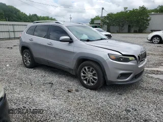 2019 Jeep Cherokee Latitude Plus with VIN 1C4PJLLB8KD176302, listed as a Copart auction lot 58181595 with 175,661 mi miles and Salvage title. Bid and sale history available at DreamBid. Image 4.