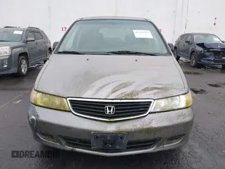 2000 Honda Odyssey LX z VIN 2HKRL1857YH570211, wystawiony jako IAAI lot #42139263 z przebiegiem 161 983 mil mil oraz . Historia ofert i sprzedaży dostępna na DreamBid. Obrazek 6.