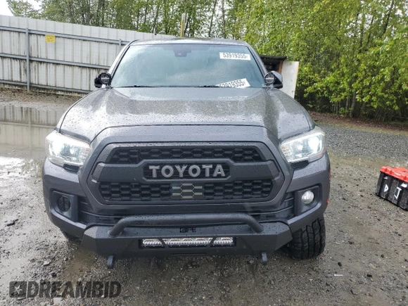 2019 Toyota Tacoma SR with VIN 3TMCZ5AN7KM237563, listed as a Copart auction lot 53919355 with 65,392 mi miles and Salvage title. Bid and sale history available at DreamBid. Image 5.