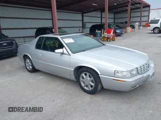 2000 Cadillac Eldorado Touring ETC z VIN 1G6ET1295YU135254, wystawiony jako IAAI lot #42526176 z przebiegiem 100 845 mil mil oraz . Historia ofert i sprzedaży dostępna na DreamBid. Obrazek 1.