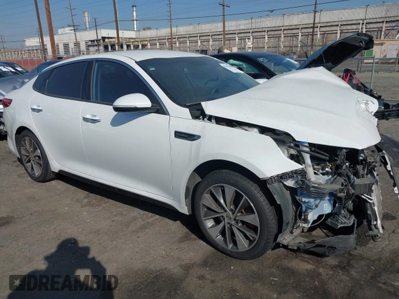 2016 Kia Optima SX Turbo with VIN 5XXGW4L2XGG043934, listed as a IAAI auction lot 40451940 with 86,386 mi miles and . Bid and sale history available at carsss.com. Image 1.