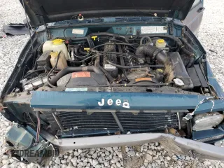1996 Jeep Cherokee Country with VIN 1J4FJ78S7TL242853, listed as a Copart auction lot 73022554 with 84,868 mi miles and Salvage Title. Bid and sale history available at carsss.com. Image 13.