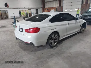 2014 BMW 4 Series 435i xDrive with VIN WBA3R5C54EK186187, listed as a IAAI auction lot 42248064 with 73,532 mi miles and . Bid and sale history available at DreamBid. Image 4.