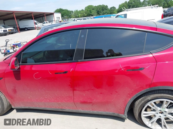 2023 Tesla Model Y Long Range z VIN 7SAYGAEE7PF691499, wystawiony jako IAAI lot #42038850 z przebiegiem 26 439 mil mil oraz . Historia ofert i sprzedaży dostępna na DreamBid. Obrazek 15.