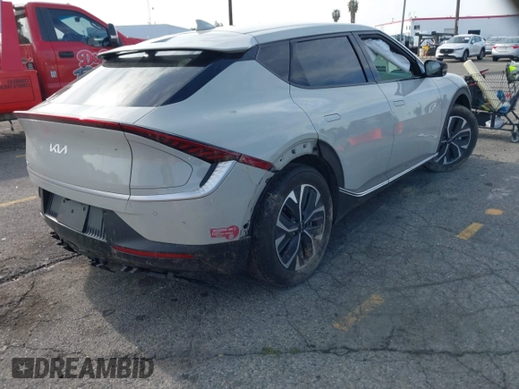 2024 Kia EV6 Wind with VIN KNDC34LA1R5214852, listed as a IAAI auction lot 41818262 with 14,950 mi miles and . Bid and sale history available at DreamBid. Image 4.