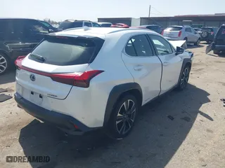2021 Lexus UX with VIN JTHX9JBH9M2040678, listed as a IAAI auction lot 41727164 with 71,004 mi miles. Bid and sale history available at carsss.com. Image 4.