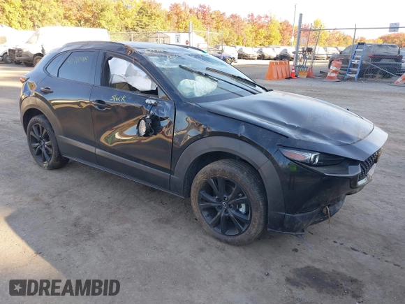 2023 Mazda CX-30 2.5 S Premium Package with VIN 3MVDMBDM5PM536219, listed as a IAAI auction lot 40710444 with 16,863 mi miles. Bid and sale history available at carsss.com. Image 1.