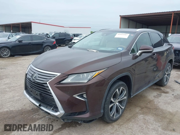 2016 Lexus RX 350 z VIN 2T2ZZMCA5GC029529, wystawiony jako IAAI lot #41953567 z przebiegiem 133 460 mil mil oraz . Historia ofert i sprzedaży dostępna na DreamBid. Obrazek 2.
