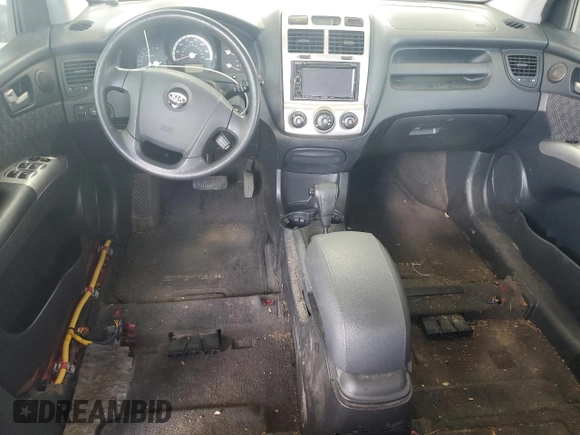 2006 Kia Sportage LX with VIN KNDJF723167175943, listed as a Copart auction lot 71505474 with Not Provided miles and Clean Title. Bid and sale history available at DreamBid. Image 8.