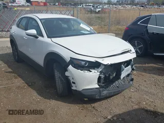 2021 Mazda CX-30 S with VIN 3MVDMBAL6MM206130, listed as a IAAI auction lot 42122917 with 90,485 mi miles and . Bid and sale history available at DreamBid. Image 1.