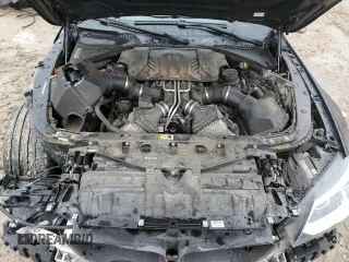 2015 BMW M6 z VIN WBS6C9C50FD467894, wystawiony jako Copart lot #70394234 z przebiegiem 72 625 mil mil oraz Szkoda całkowita • Salvage title. Historia ofert i sprzedaży dostępna na DreamBid. Obrazek 11.