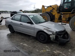 2001 Mitsubishi Mirage ES z VIN JA3AY26C91U026230, wystawiony jako Copart lot #74546944 z przebiegiem 172 111 mil mil oraz Szkoda całkowita • Salvage title. Historia ofert i sprzedaży dostępna na DreamBid. Obrazek 4.