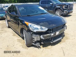 2012 Hyundai Veloster w/Black Int with VIN KMHTC6AD0CU056828, listed as a IAAI auction lot 42611623 with 136,242 mi miles and . Bid and sale history available at DreamBid. Image 6.