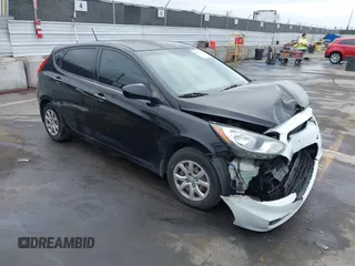 2013 Hyundai Accent GL with VIN KMHCT5AEXDU092644, listed as a IAAI auction lot 42078339 with 134,288 mi miles. Bid and sale history available at carsss.com. Image 1.