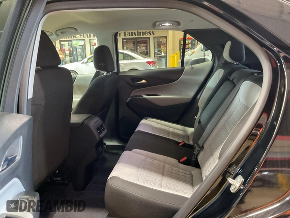 2023 Chevrolet Equinox LT with VIN 3GNAXTEG3PL252918, listed as a IAAI auction lot 42749933 with 34,377 mi miles and . Bid and sale history available at DreamBid. Image 4.