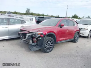 2018 Mazda CX-5 Grand Touring with VIN JM3KFBDM8J0340926, listed as a IAAI auction lot 40595539 with 114,019 mi miles. Bid and sale history available at carsss.com. Image 2.