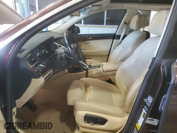 2015 BMW 5 Series 535i Gran Turismo xDrive with VIN WBA5M4C59FD184037, listed as a Copart auction lot 59118945 with 128,263 mi miles and Salvage title. Bid and sale history available at DreamBid. Image 7.
