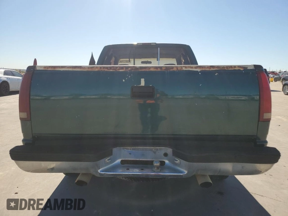 1995 GMC Sierra 1500 with VIN 2GTEC19H9S1560019, listed as a Copart auction lot 79917704 with 259,042 mi miles and Clean Title. Bid and sale history available at DreamBid. Image 6.