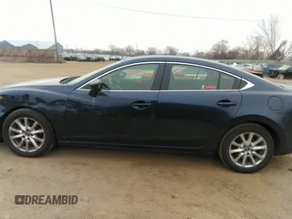 2015 Mazda 6 i Sport with VIN JM1GJ1U51F1185105, listed as a IAAI auction lot 41287570 with 133,016 mi miles and . Bid and sale history available at carsss.com. Image 14.