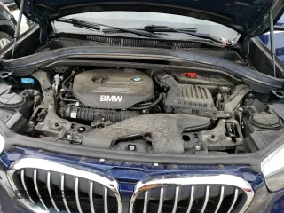 2018 BMW X1 xDrive28i with VIN WBXHT3C37J5K27663, listed as a Copart auction lot 38185933 with 61,894 mi miles. Bid and sale history available at carsss.com. Image 12.
