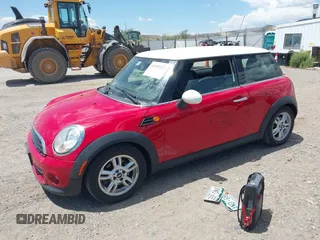 2011 MINI Hardtop with VIN WMWSU3C58BT182728, listed as a IAAI auction lot 42393337 with 142,386 mi miles and . Bid and sale history available at DreamBid. Image 2.
