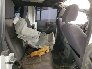 2013 Jeep Wrangler Unlimited Sport z VIN 1C4BJWDG8DL513680, wystawiony jako Copart lot #53805485 z przebiegiem 135 676 mil mil oraz Szkoda całkowita • Salvage title. Historia ofert i sprzedaży dostępna na DreamBid. Obrazek 11.