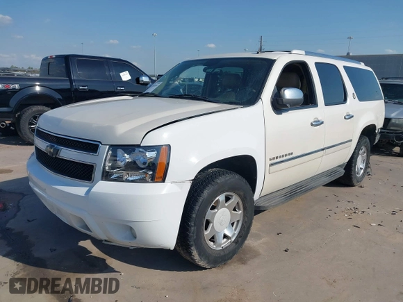2010 Chevrolet Suburban LTZ with VIN 1GNUCKE06AR277074, listed as a IAAI auction lot 41828184 with 260,839 mi miles. Bid and sale history available at carsss.com. Image 2.