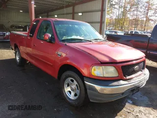 2000 Ford F-150 XL with VIN 1FTRX17L7YKA59717, listed as a IAAI auction lot 40887691 with 104,095 mi miles. Bid and sale history available at carsss.com. Image 1.