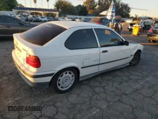 1995 BMW 3 Series 318Ti with VIN WBACG6327SAM70562, listed as a Copart auction lot 80928464 with 259,020 mi miles and Salvage Title. Bid and sale history available at carsss.com. Image 3.