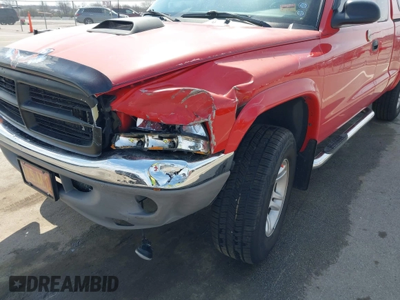 2003 Dodge Dakota z VIN 1D7HG42X93S296117, wystawiony jako IAAI lot #42045149 z przebiegiem 161 725 mil mil oraz . Historia ofert i sprzedaży dostępna na DreamBid. Obrazek 6.
