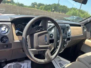 2014 Ford F-150 XL with VIN 1FTFW1EF8EKF95400, listed as a IAAI auction lot 42414535 with 148,227 mi miles and . Bid and sale history available at DreamBid. Image 1.