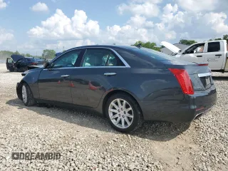 2014 Cadillac CTS AWD with VIN 1G6AW5SX9E0133215, listed as a Copart auction lot 61052055 with 179,614 mi miles and Salvage title. Bid and sale history available at DreamBid. Image 2.