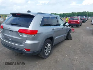 2014 Jeep Grand Cherokee Limited with VIN 1C4RJFBGXEC517832, listed as a IAAI auction lot 42583697 with 107,719 mi miles and . Bid and sale history available at DreamBid. Image 4.