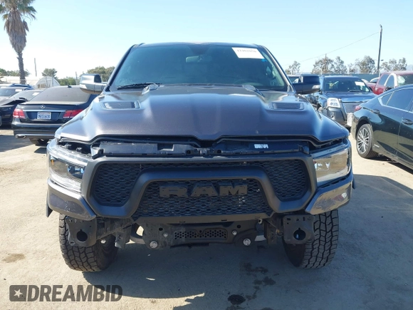 2022 Ram 1500 Rebel z VIN 1C6SRFLT4NN177112, wystawiony jako IAAI lot #42402050 z przebiegiem 26 239 mil mil oraz . Historia ofert i sprzedaży dostępna na DreamBid. Obrazek 12.