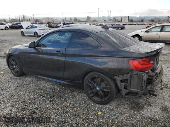 2014 BMW 2 Series M235i with VIN WBA1J7C55EVW84665, listed as a Copart auction lot 44257115 with 111,461 mi miles and Salvage title. Bid and sale history available at DreamBid. Image 2.