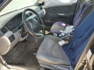 1997 Nissan Sentra XE z VIN 3N1AB41D3VL035555, wystawiony jako Copart lot #76200984 z przebiegiem 166 012 mil mil oraz Szkoda całkowita • Salvage title. Historia ofert i sprzedaży dostępna na DreamBid. Obrazek 7.