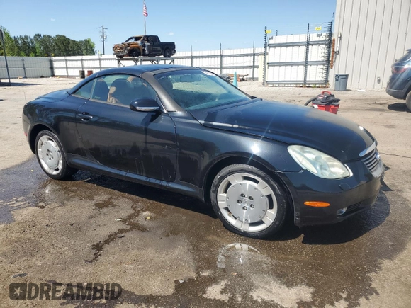 2003 Lexus SC 430 with VIN JTHFN48Y730047333, listed as a Copart auction lot 52112085 with 106,750 mi miles and Salvage title. Bid and sale history available at DreamBid. Image 4.