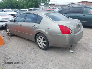 2004 Nissan Maxima SE with VIN 1N4BA41E74C858809, listed as a IAAI auction lot 42436562 with 198,105 mi miles and . Bid and sale history available at DreamBid. Image 3.