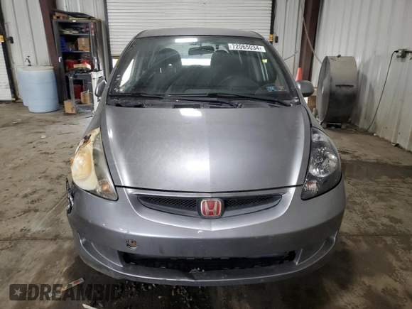 2007 Honda Fit with VIN JHMGD38437S002477, listed as a Copart auction lot 72065034 with 59,192 mi miles and Salvage Title. Bid and sale history available at carsss.com. Image 5.