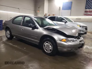 1999 Dodge Stratus z VIN 1B3EJ46X0XN690121, wystawiony jako Copart lot #83056374 z przebiegiem Nie podano mil oraz Szkoda całkowita • Salvage title. Historia ofert i sprzedaży dostępna na DreamBid. Obrazek 4.