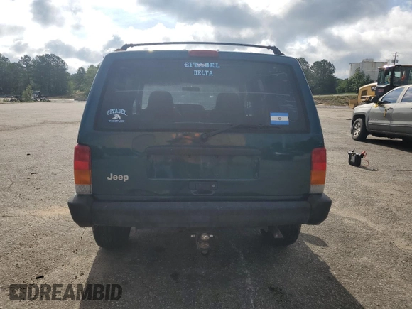 1998 Jeep Cherokee Sport with VIN 1J4FJ68S9WL249365, listed as a Copart auction lot 58896155 with 344,530 mi miles and Clean title. Bid and sale history available at DreamBid. Image 6.