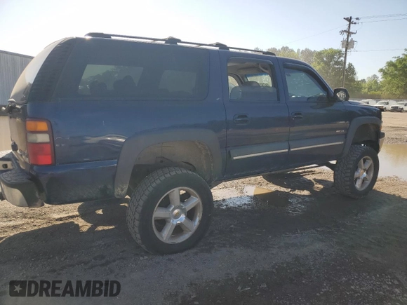 2003 Chevrolet Suburban LT z VIN 1GNEC16Z63J237235, wystawiony jako Copart lot #52782285 z przebiegiem 241 272 mil mil oraz Szkoda całkowita • Salvage title. Historia ofert i sprzedaży dostępna na DreamBid. Obrazek 3.