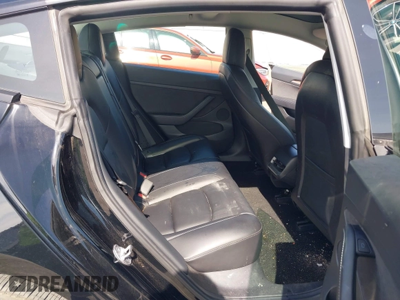 2022 Tesla Model 3 Long Range with VIN 5YJ3E1EB1NF133356, listed as a IAAI auction lot 41568303 with 73,406 mi miles and . Bid and sale history available at DreamBid. Image 8.