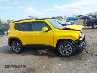 2017 Jeep Renegade Latitude z VIN ZACCJBBB7HPG40829, wystawiony jako IAAI lot #42065201 z przebiegiem 92 754 mil mil oraz . Historia ofert i sprzedaży dostępna na DreamBid. Obrazek 14.