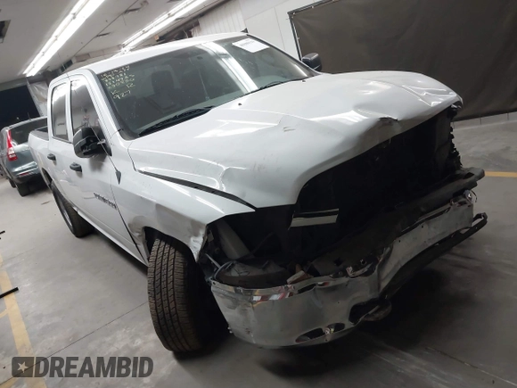 2012 Ram 1500 Tradesman with VIN 1C6RD6KP2CS280836, listed as a IAAI auction lot 40880119 with 84,748 mi miles and . Bid and sale history available at DreamBid. Image 1.
